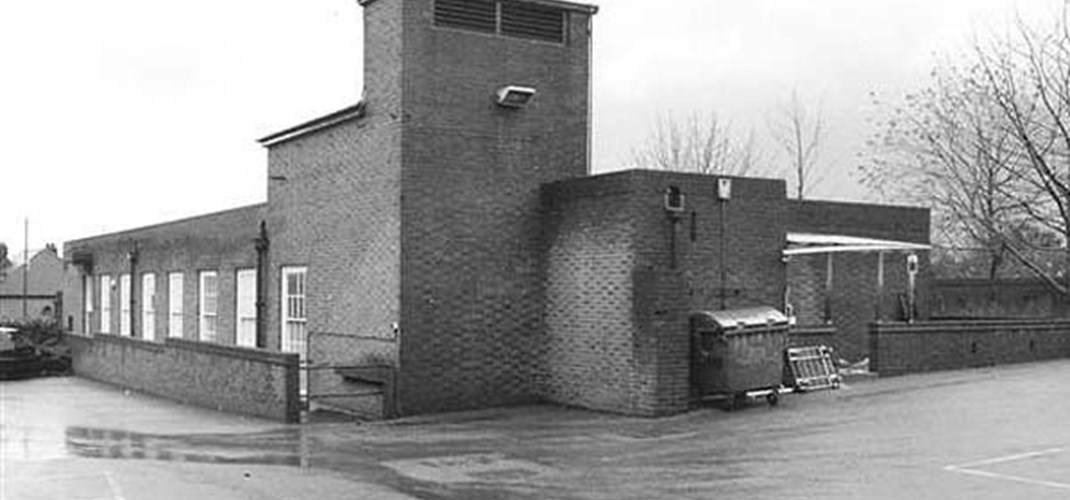 Black and white photo of the outside of Winston Churchill's paddock